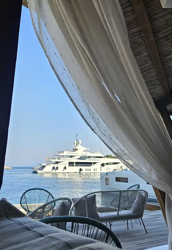 Beach bar overlooking yacht