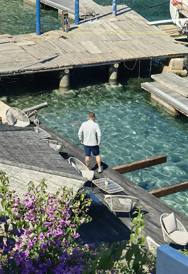 Man standing by the sea